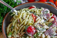 Creamy Tuscan Pasta Salad Recipe with Sun-Dried Tomatoes and Spinach