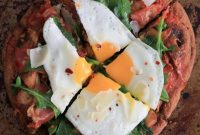 Grilled Pita Pizza with Prosciutto, Chanterelles, Arugula & Fried Egg