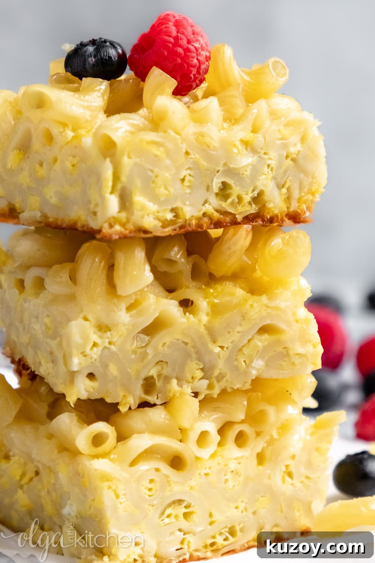 Baked Sweet Pasta and Egg Casserole Recipe 2 Baked Sweet Pasta Eggs Casserole is a childhood dish and a major family pleaser. Every bite is loaded with pasta and eggs with a little hint of sweetness within each bite. #pasta #bakedpasta #onepotmeal #pastacasserole #dessertpasta #breakfast #olgainthekitchen