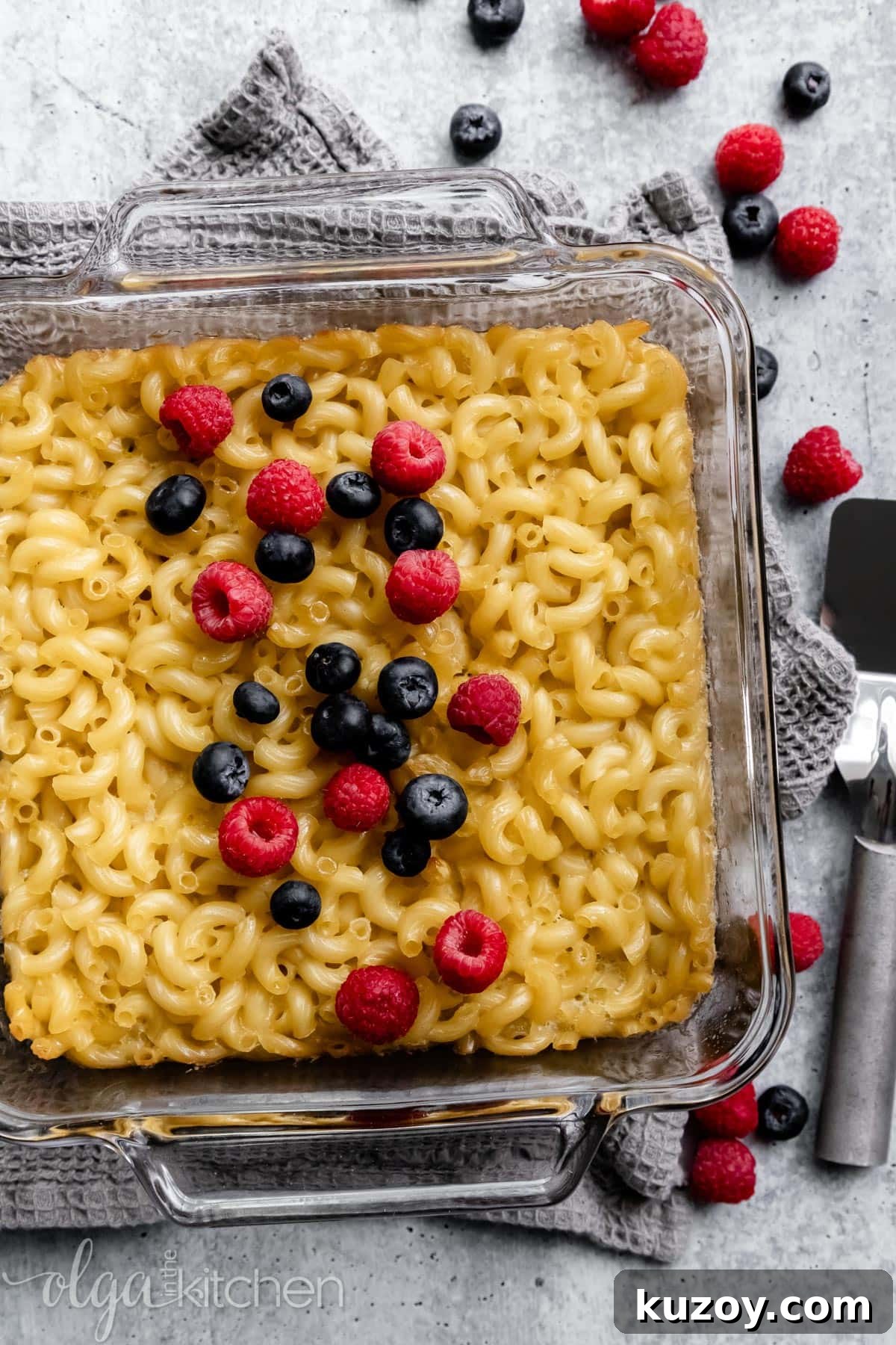 Baked Sweet Pasta and Egg Casserole Recipe 8 Baked Sweet Pasta Eggs Casserole is a childhood dish and a major family pleaser. Every bite is loaded with pasta and eggs with a little hint of sweetness within each bite. #pasta #bakedpasta #onepotmeal #pastacasserole #dessertpasta #breakfast #olgainthekitchen