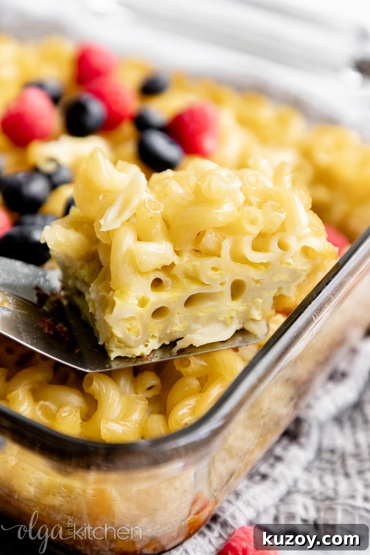 Baked Sweet Pasta and Egg Casserole Recipe 10 Baked Sweet Pasta Eggs Casserole is a childhood dish and a major family pleaser. Every bite is loaded with pasta and eggs with a little hint of sweetness within each bite. #pasta #bakedpasta #onepotmeal #pastacasserole #dessertpasta #breakfast #olgainthekitchen