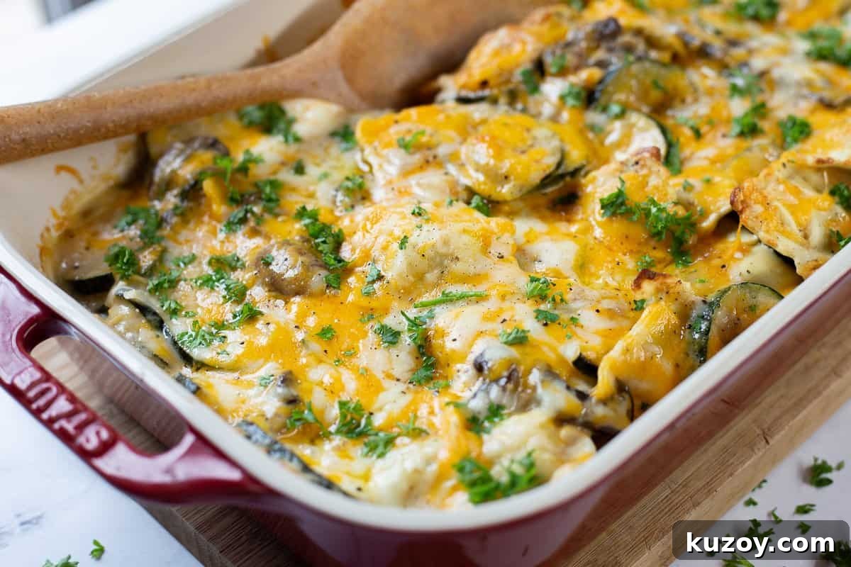 Baked Ravioli Alfredo Casserole with Creamy Parmesan Sauce 11 Finished dish of Creamy Ravioli Alfredo baked and topped with fresh parsley.