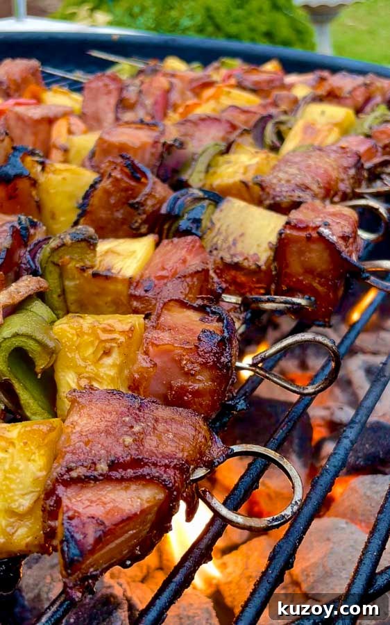 Grilled Bourbon Bacon, Ham & Pineapple Kabobs Recipe 2 fire underneath of Bourbon Bacon Ham and Pineapple Kabobs on the Grill