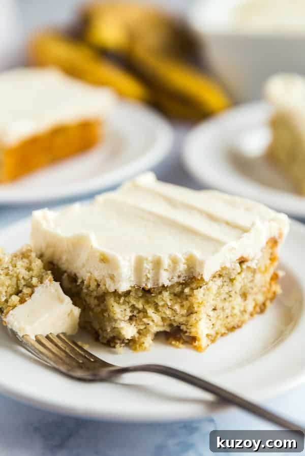 Classic Grandma’s Banana Cake Recipe for Moist, Flavorful Slices 2 Grandma's Best Banana Cake recipe with a bite taken out of it.