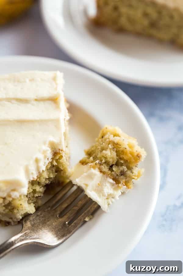 Classic Grandma’s Banana Cake Recipe for Moist, Flavorful Slices 4 A bite one a fork of Grandma's Best Banana Cake recipe.