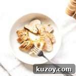 Pork loin in a white bowl.