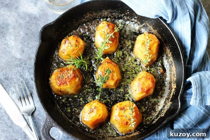 Russet Idaho Fondant Potatoes Recipe: Crispy Sides, Tender Centers 18 Horizontal Photo of Fondant potatoes in a cast iron sklllet