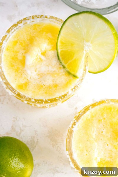 Frozen Pineapple Margarita Recipe — 4-Ingredient Tropical Cocktail 4 overshot of frozen pineapple margarita