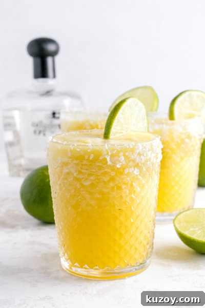 Frozen Pineapple Margarita Recipe — 4-Ingredient Tropical Cocktail 6 2 glasses of pineapple margarita