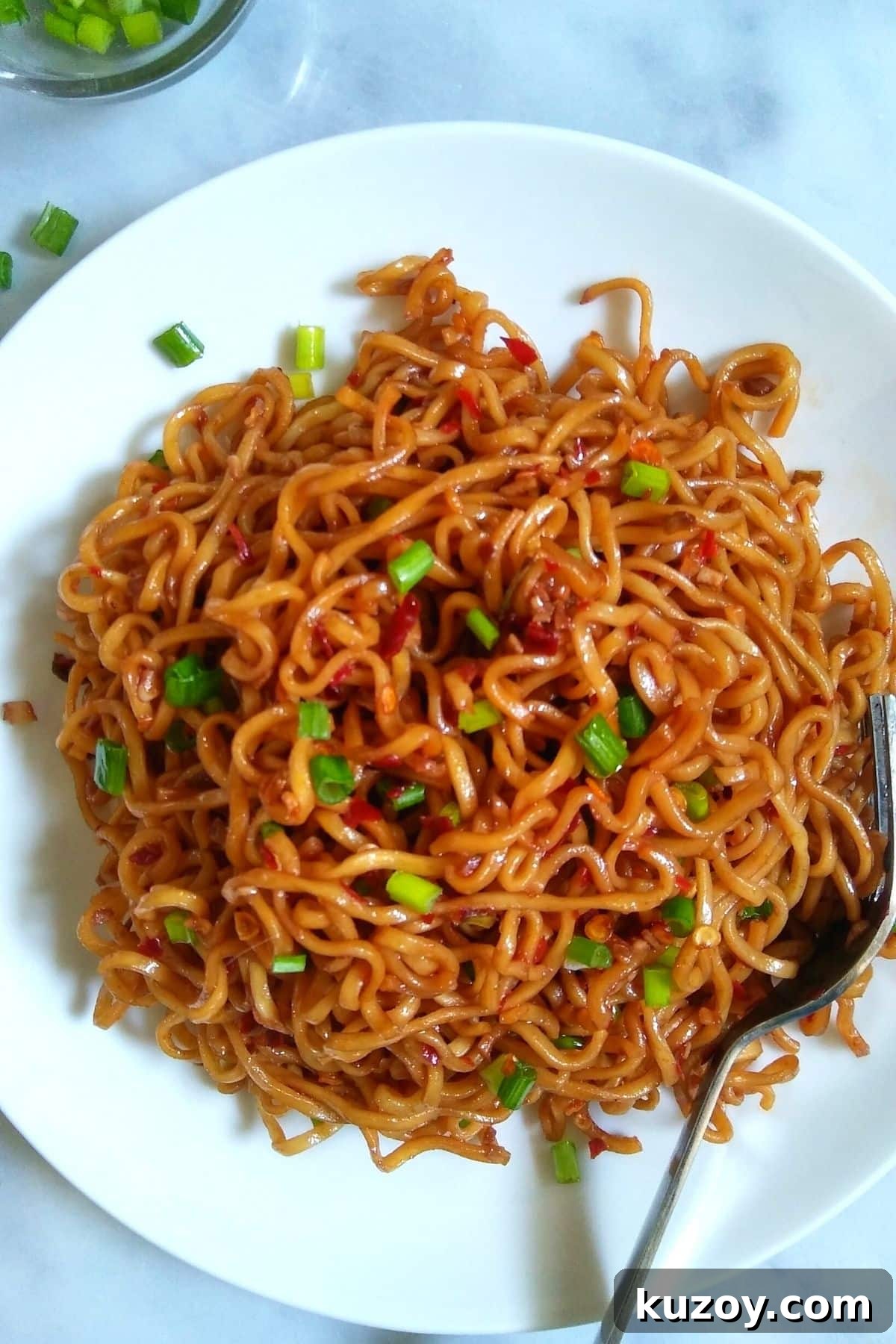 Image showing ramen noodles served on a white plate.