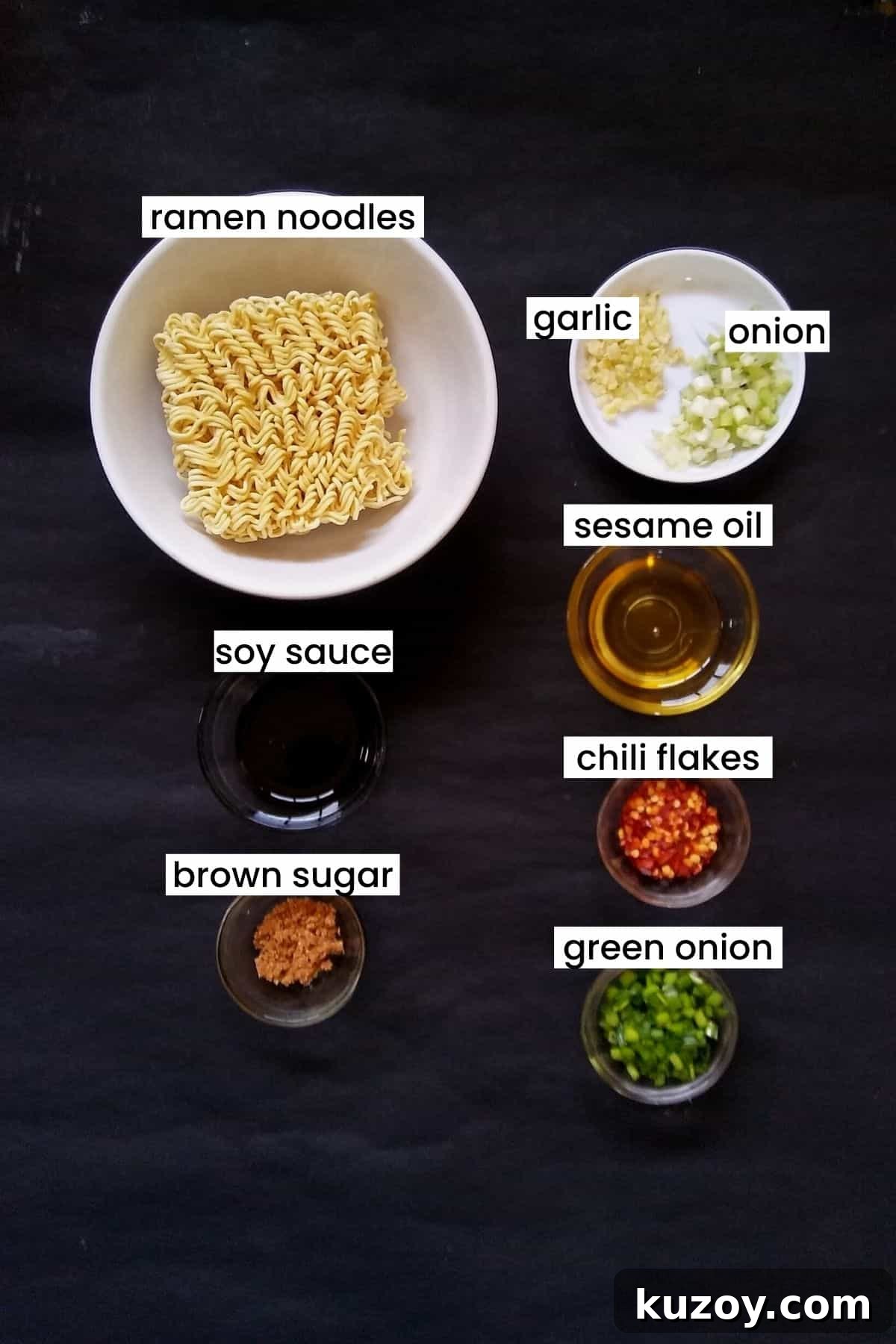 Image showing spicy ramen noodles ingredients on a black background.