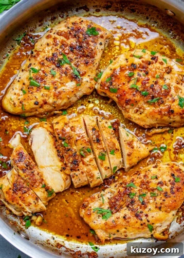 A skillet of garlic butter chicken breasts.