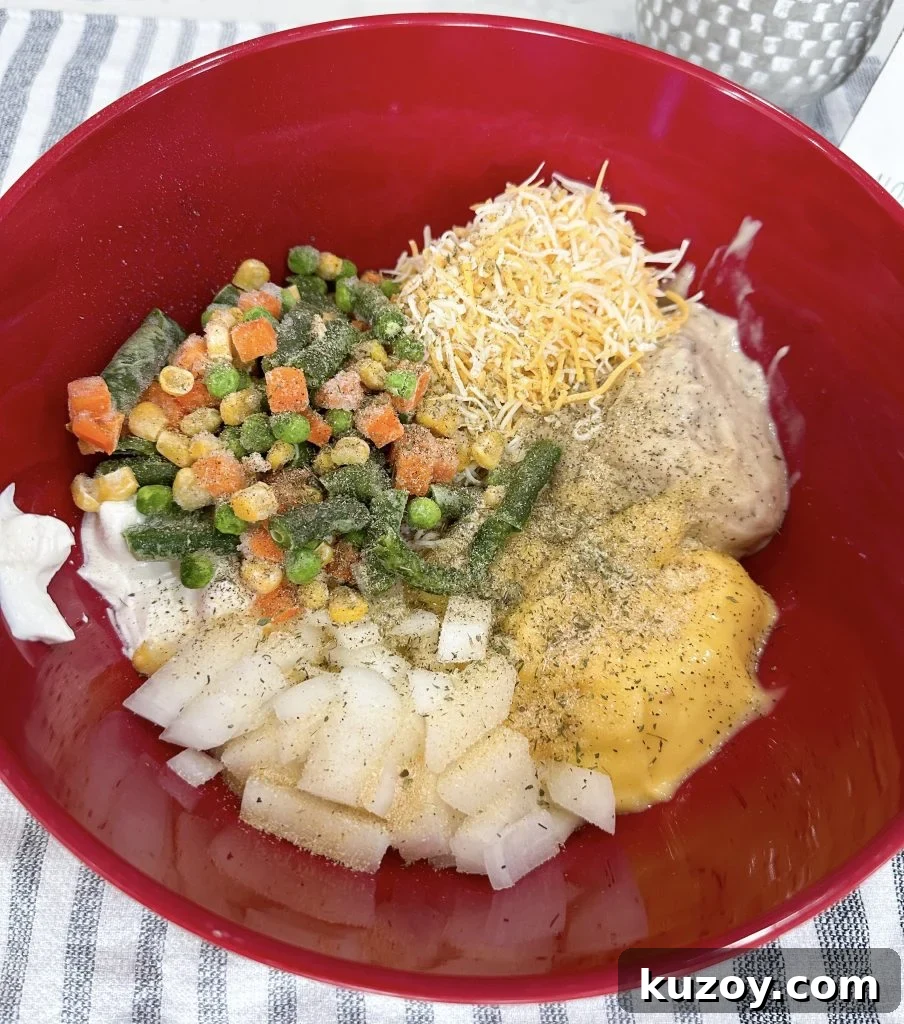 Dump-and-Bake Chicken Noodle Casserole Recipe for Busy Nights 5 Mixing casserole ingredients