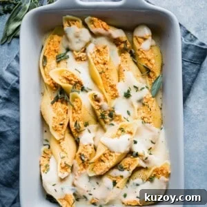Casserole dish with ricotta stuffed shells inside