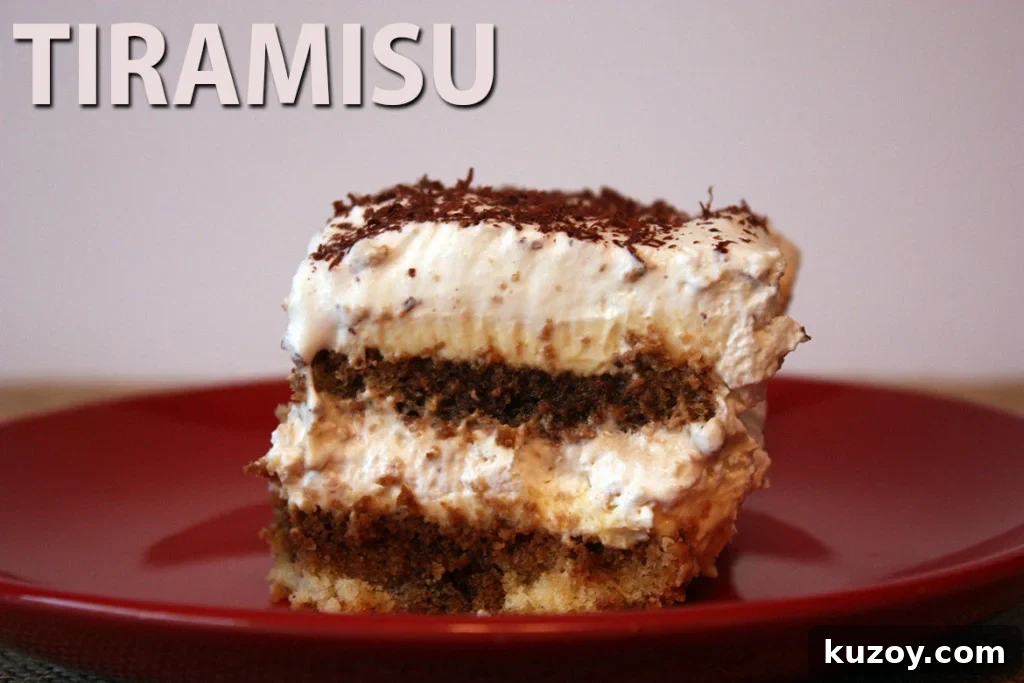 Tiramisu Without Ladyfingers: Simple Mascarpone Recipe 2 A slice of tiramisu on a red plate.