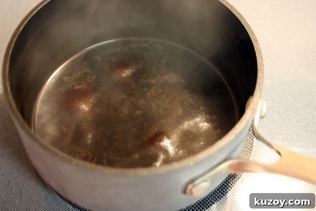 Tiramisu Without Ladyfingers: Simple Mascarpone Recipe 6 Espresso sugar reduction in a saucepan.