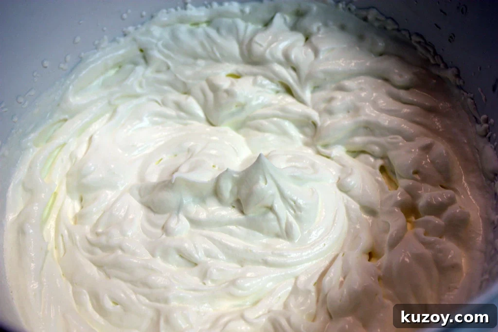 Tiramisu Without Ladyfingers: Simple Mascarpone Recipe 8 Whipped cream in a bowl.