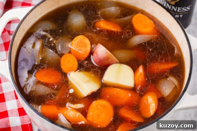 Dutch Oven Corned Beef Braised in Guinness 6 Dutch oven corned beef with veggies.