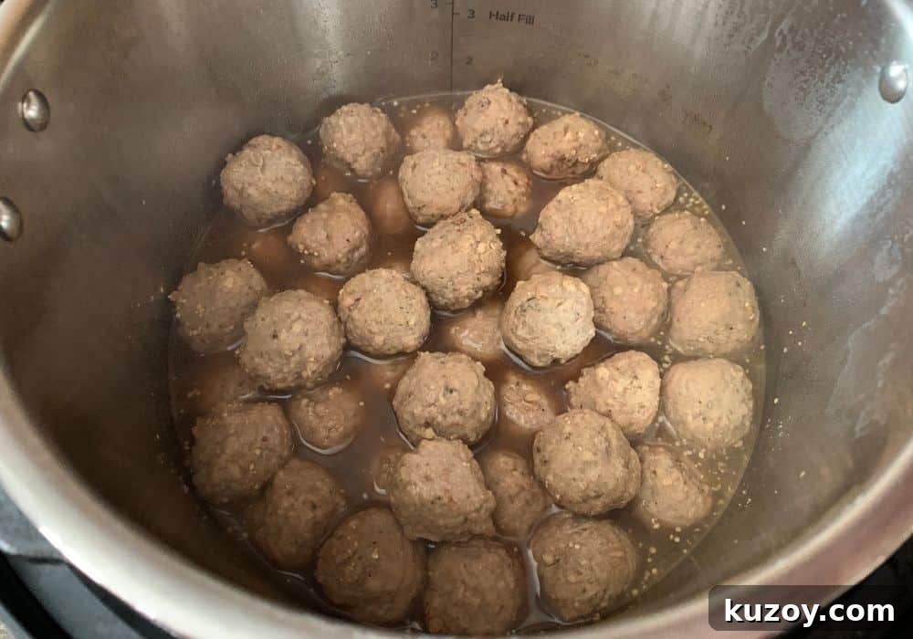 Instant Pot Swedish Meatballs Recipe: Creamy Sauce in 30 Minutes 6 cooked meatballs in the Instant Pot