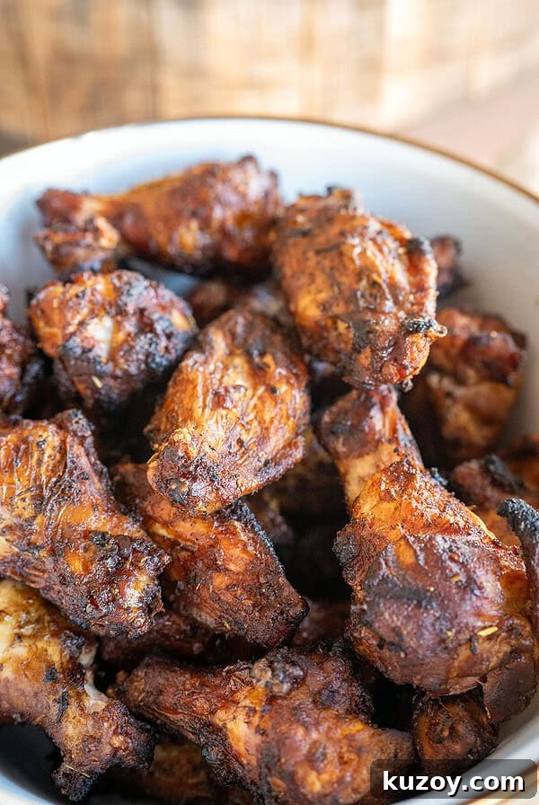 Tennessee Honey-Glazed Grilled Chicken Wings 8 Bowl of wings smoked on a drum smoker.