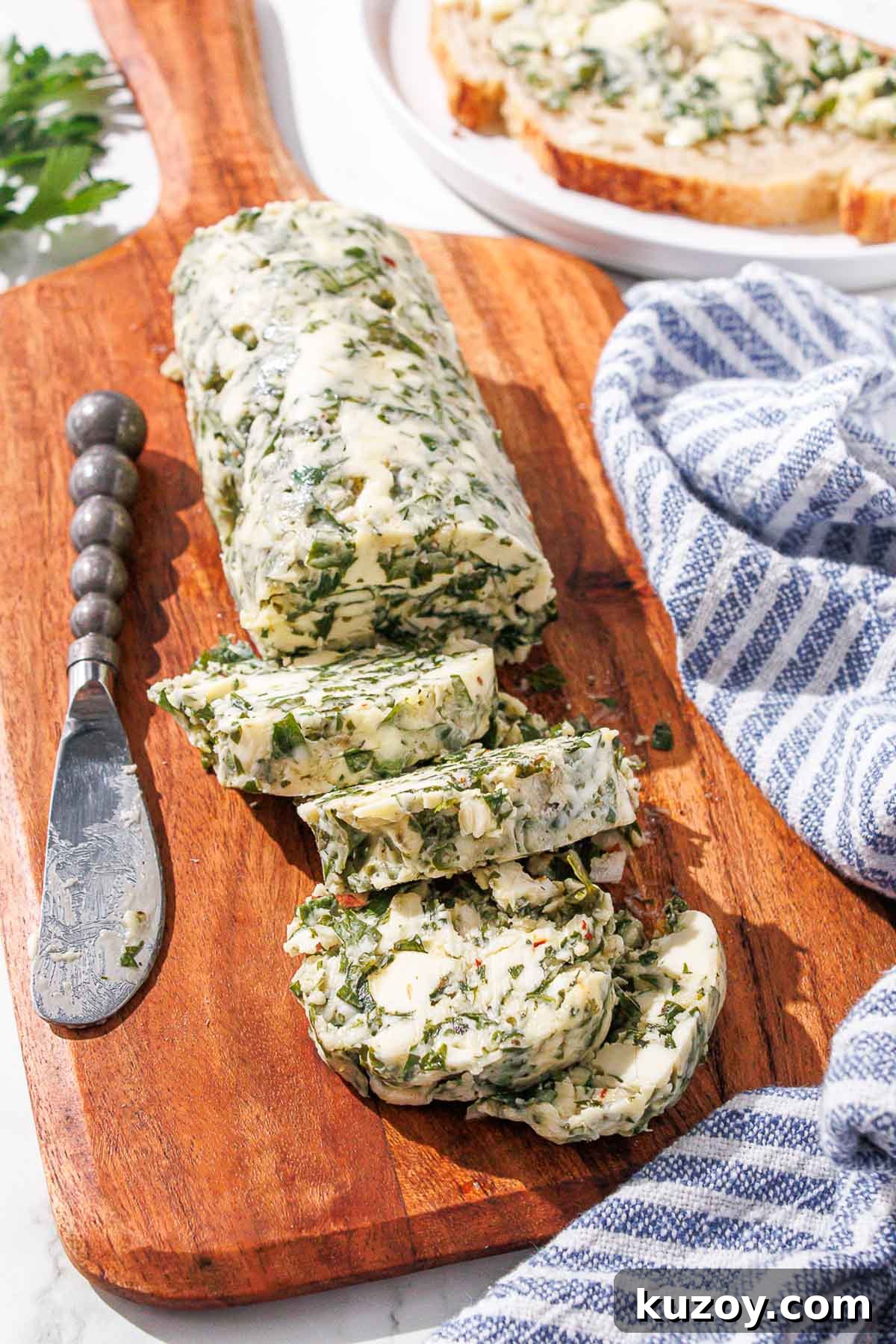 Chimichurri butter on a cutting board.