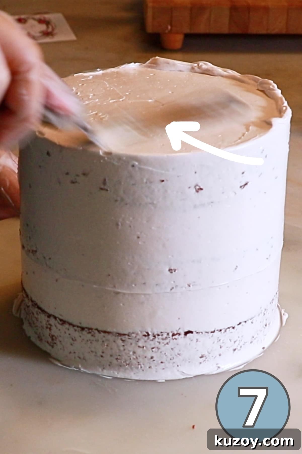 Vintage Pink Cake Ideas for Elegant Party Desserts 15 cleaning the excess buttercream on the top edge to make it sharp