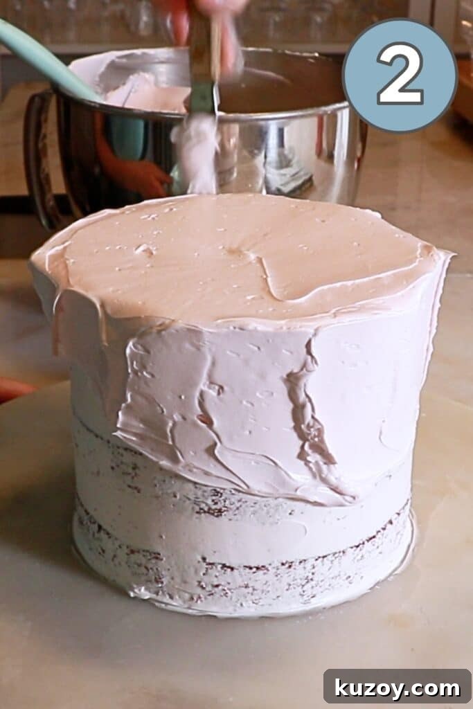 Vintage Pink Cake Ideas for Elegant Party Desserts 17 coating buttercream on sides of the cake with a cake spatula
