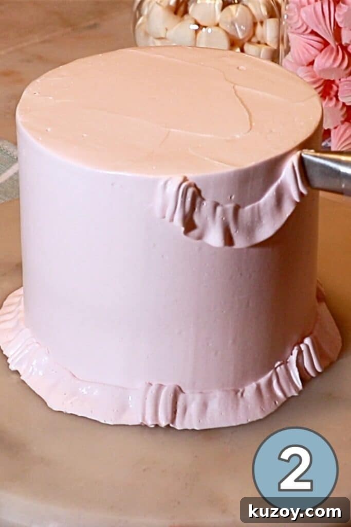 Vintage Pink Cake Ideas for Elegant Party Desserts 22 piping ruffles on the side of the buttercream cake