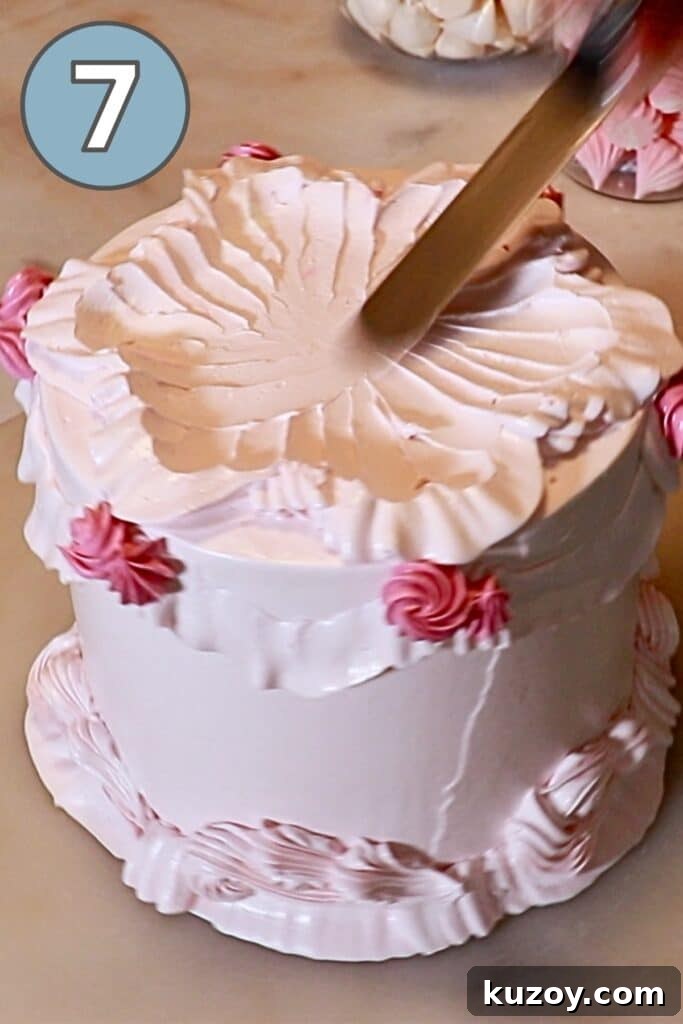 Vintage Pink Cake Ideas for Elegant Party Desserts 28 creating patterns on top of the buttercream cake using a cake spatula