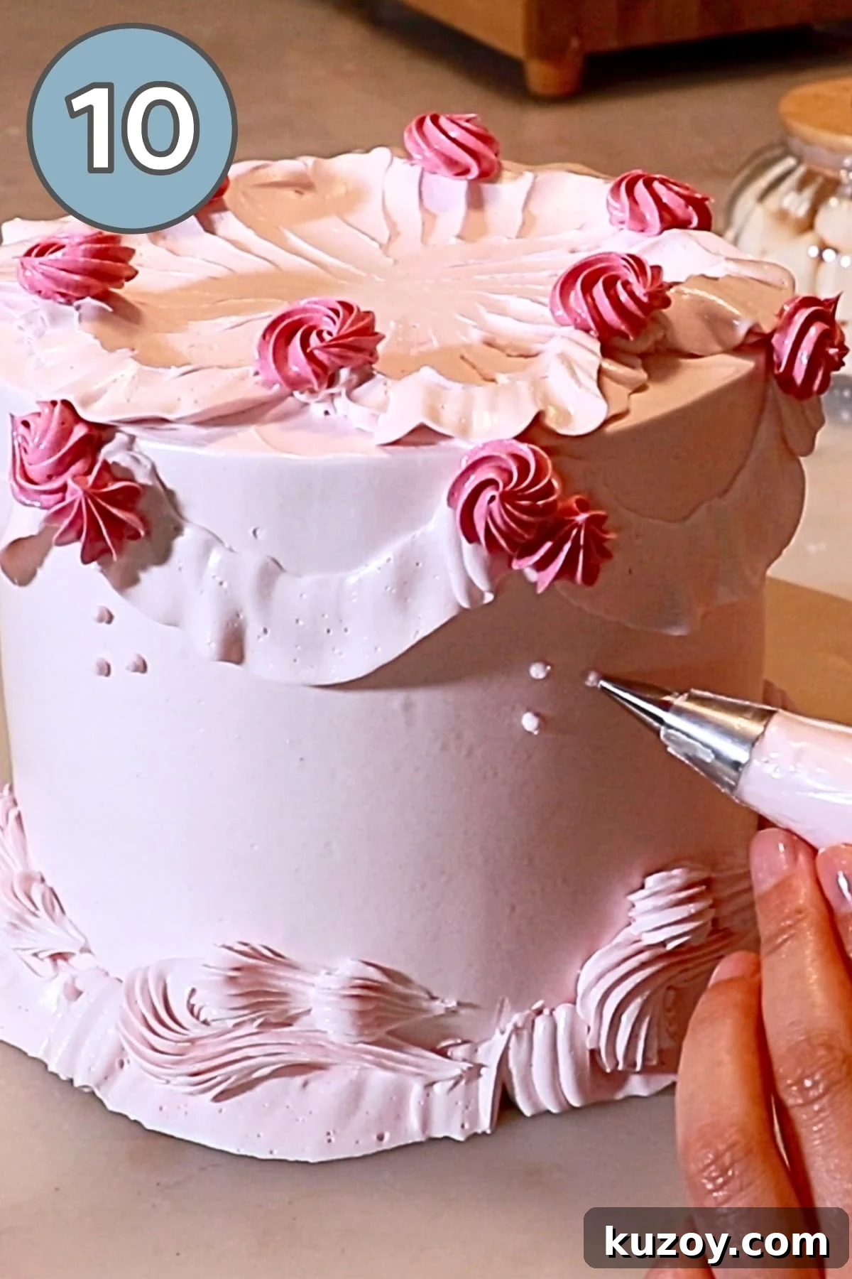 Vintage Pink Cake Ideas for Elegant Party Desserts 31 piping small dots on side of the pink vintage cake