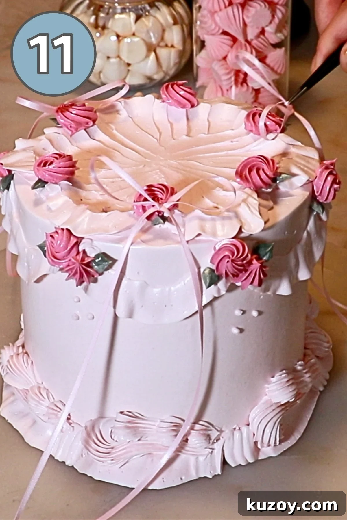 Vintage Pink Cake Ideas for Elegant Party Desserts 32 attaching pink ribbons on top of a pink vintage cake