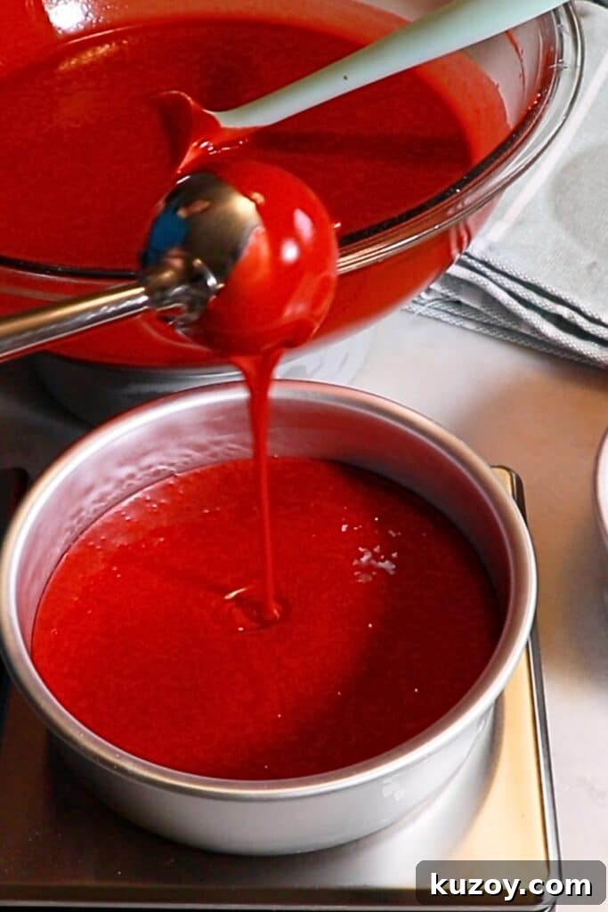 Vintage Pink Cake Ideas for Elegant Party Desserts 5 pouring red velvet cake batter into cake pans