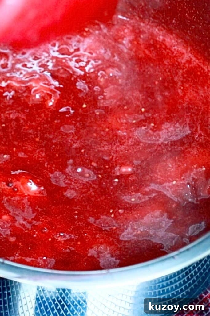 Vintage Pink Cake Ideas for Elegant Party Desserts 6 strawberry jam in a saucepan