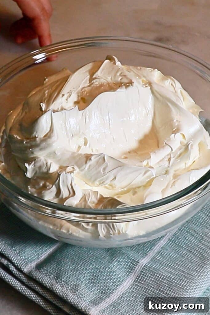 Vintage Pink Cake Ideas for Elegant Party Desserts 7 swiss meringue buttercream in a bowl