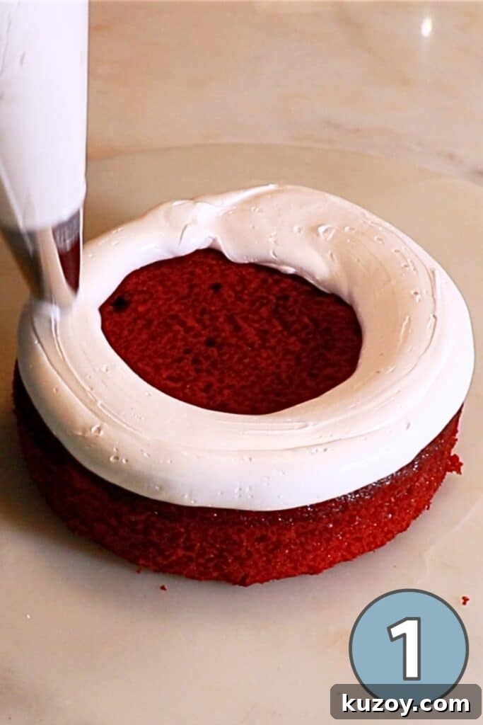 Vintage Pink Cake Ideas for Elegant Party Desserts 9 piping buttercream on a first layer of red velvet cake