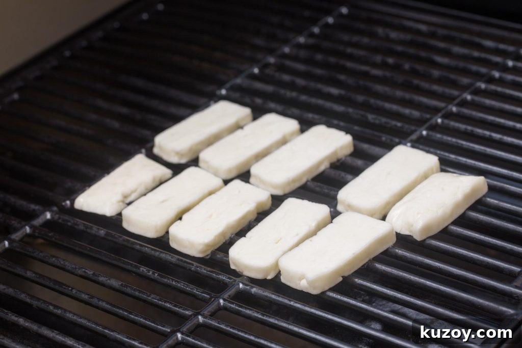 How to Grill Halloumi Perfectly for Crispy, Squeaky Cheese 3 Halloumi slices on the grill