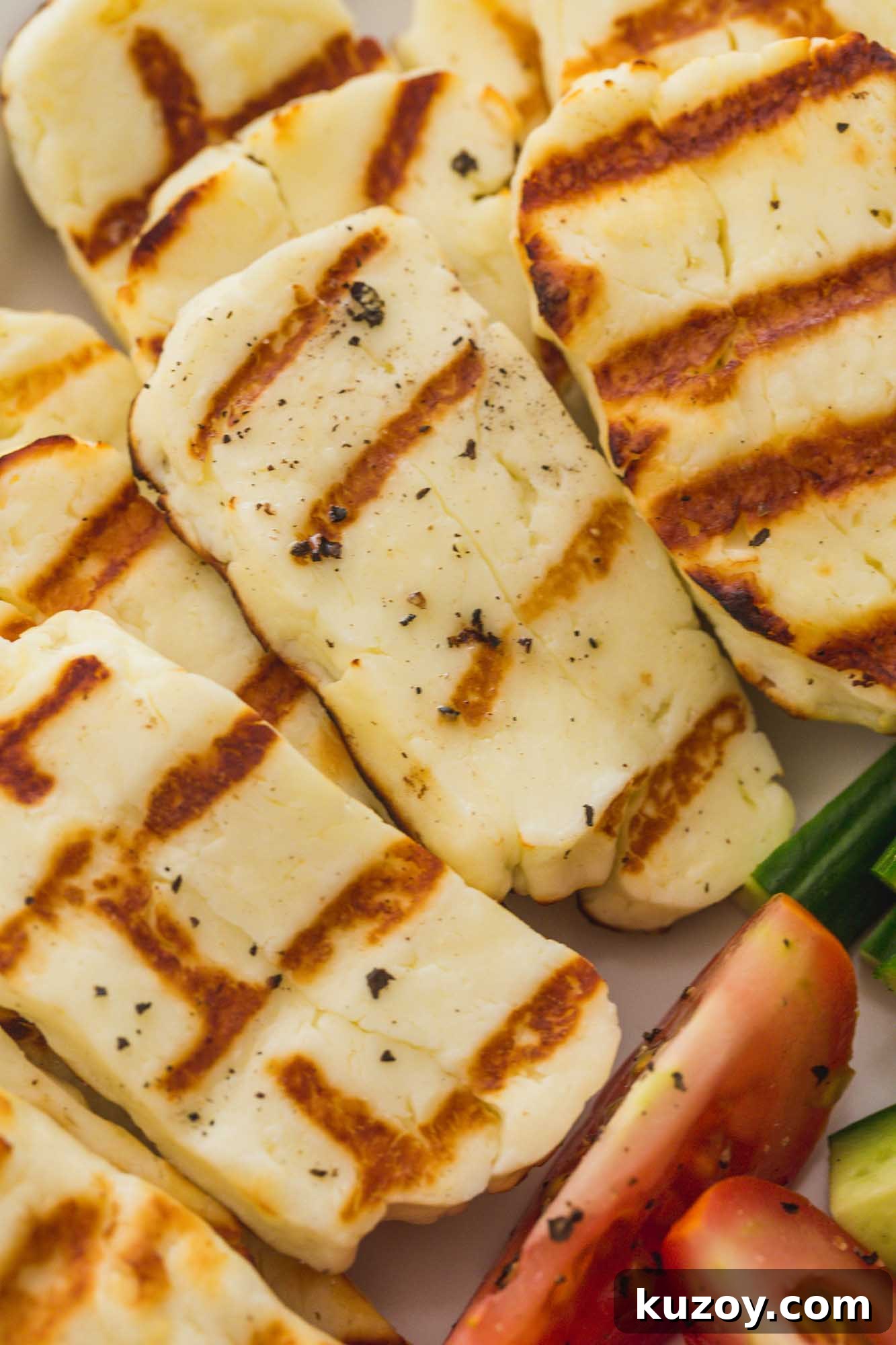 How to Grill Halloumi Perfectly for Crispy, Squeaky Cheese 4 Close up of grilled halloumi slices