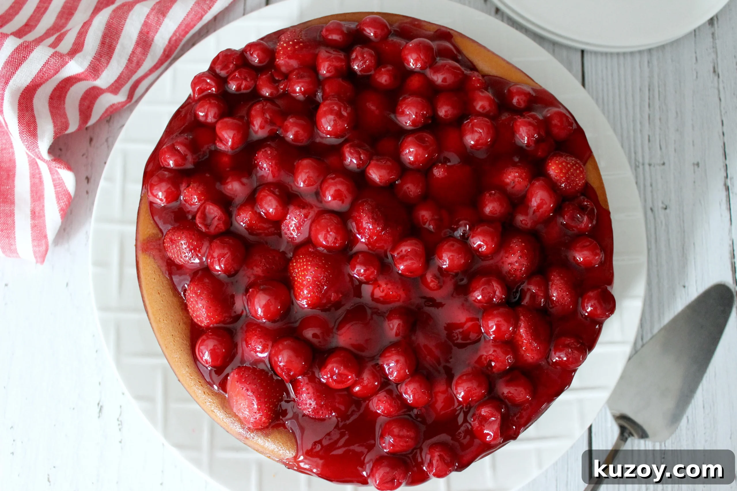 Classic Greek Cheesecake Recipe with Creamy Phyllo Crust 2 Cheesecake topped with strawberries and cherries