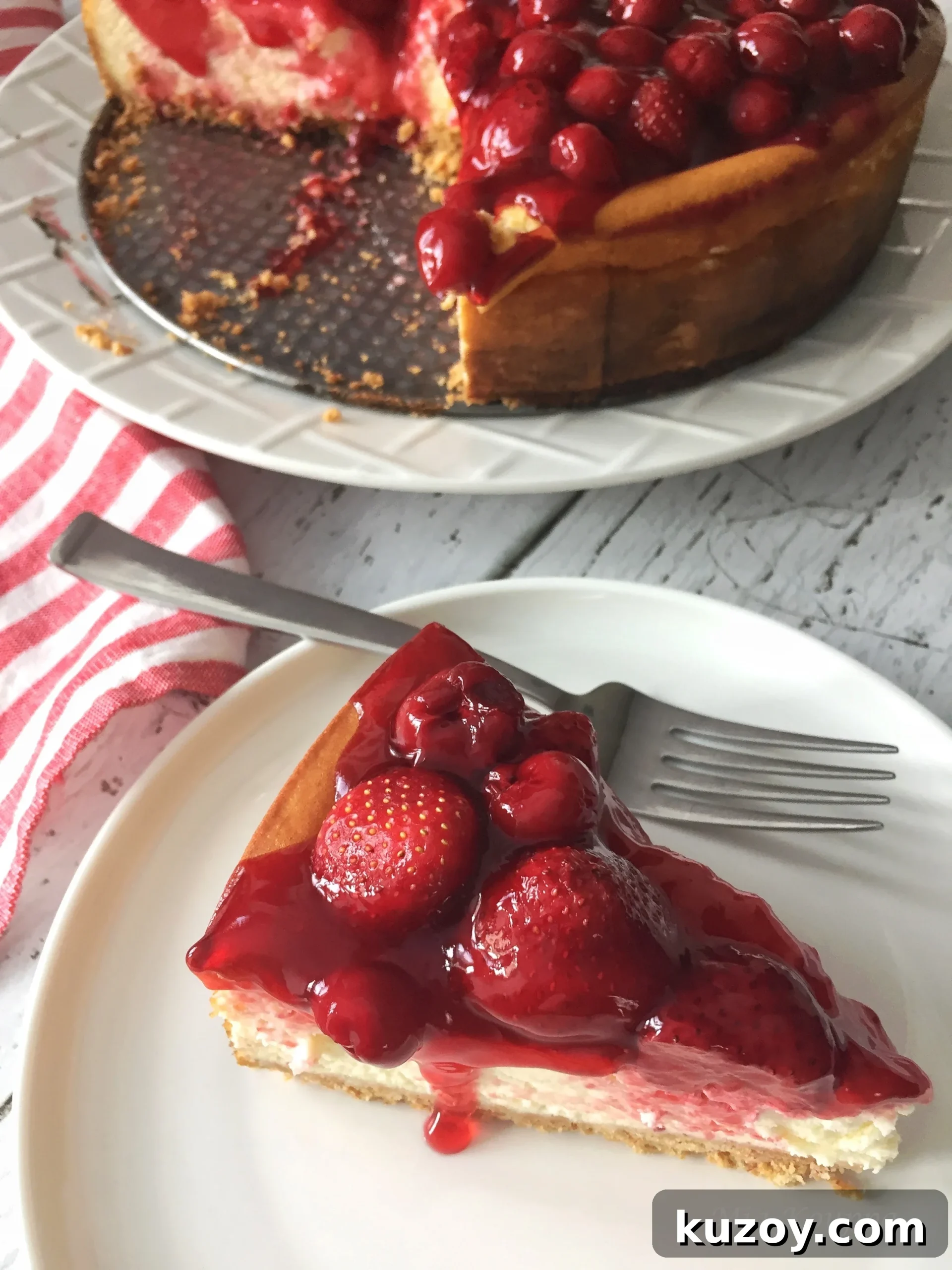 Classic Greek Cheesecake Recipe with Creamy Phyllo Crust 15 Cheesecake topped with strawberries and cherries