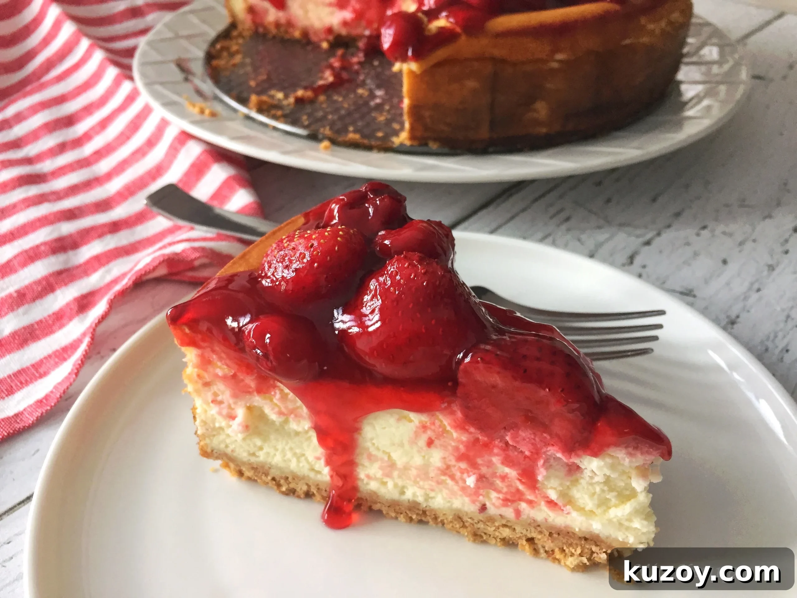 Classic Greek Cheesecake Recipe with Creamy Phyllo Crust 16 Cheesecake topped with strawberries and cherries