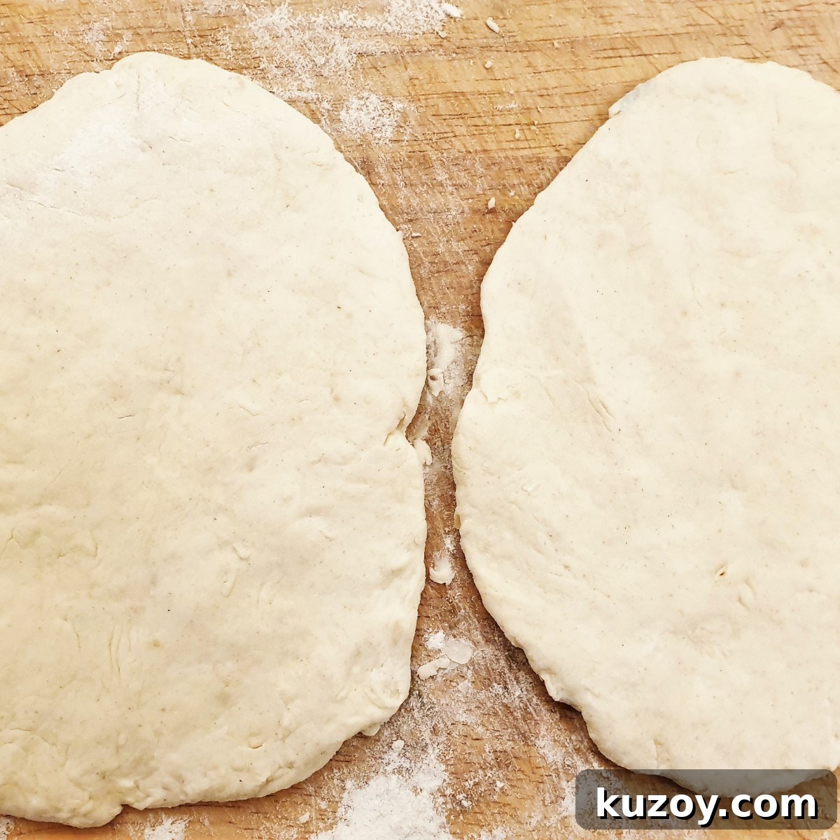 Flattened naan bread before being fried.