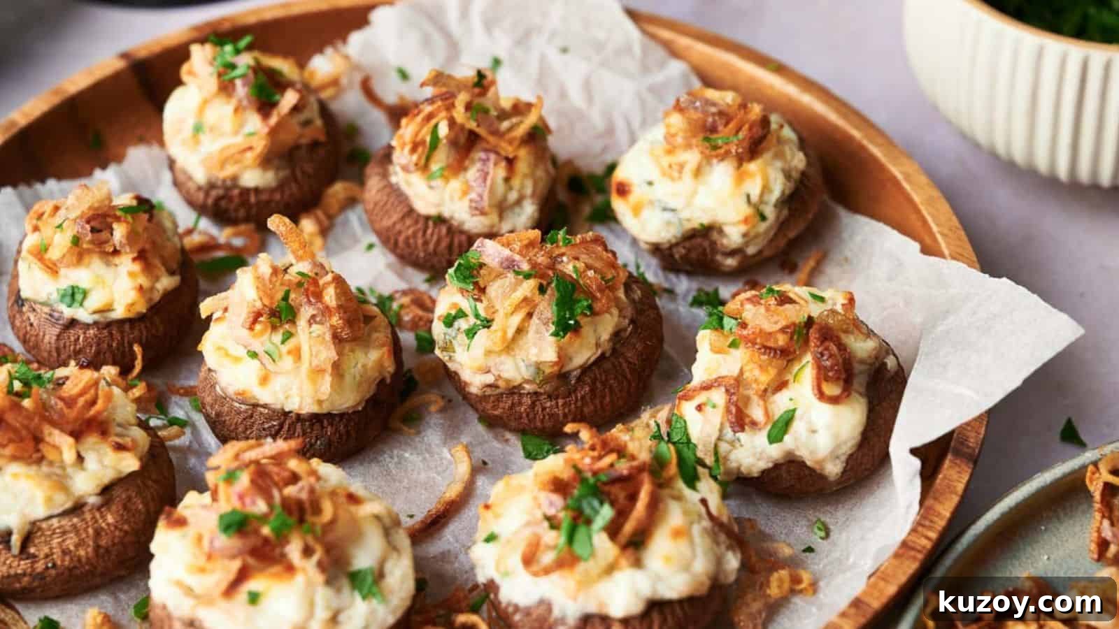 33 Must-Bring Thanksgiving Potluck Recipes for Every Year 2 Stuffed mushrooms with crispy shallots and parsley.
