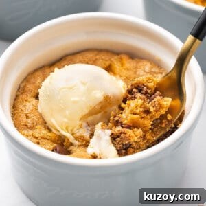 Giant Deep-Dish Chocolate Chip Cookie Recipe 6 spoonful of baked cookie dough with ice cream