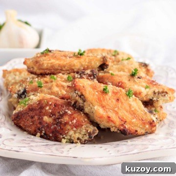 Keto Garlic Parmesan Wings in the Air Fryer 5 A plate of garlic parmesan chicken wings.