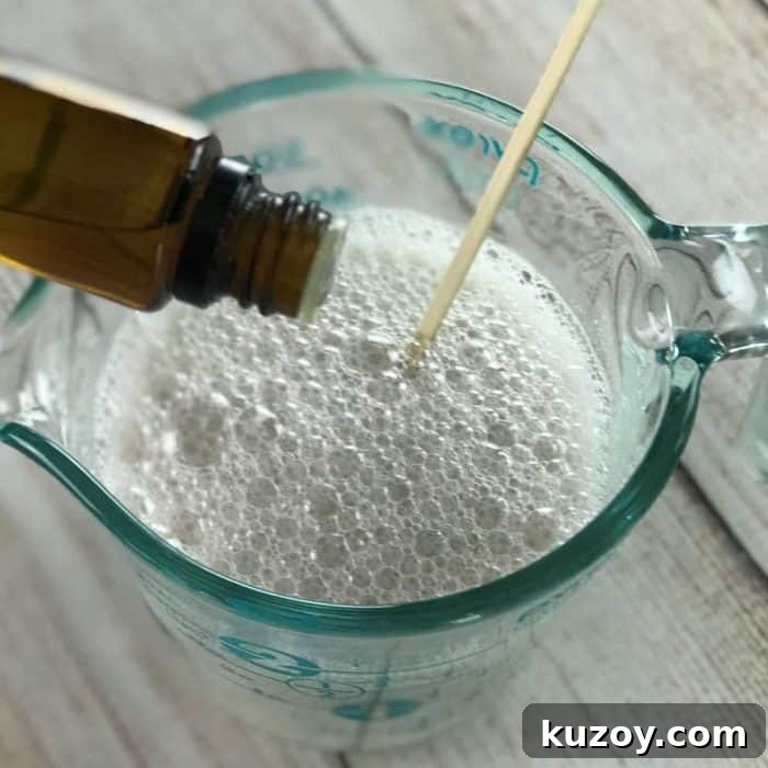 DIY Nourishing Body Wash for Dry Skin: Gentle Recipe & Tips 6 adding essential oils