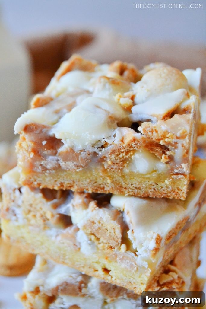 White Chocolate Nutter Butter Magic Bars Recipe 4 close up stack of white chocolate nutter butter magic bars
