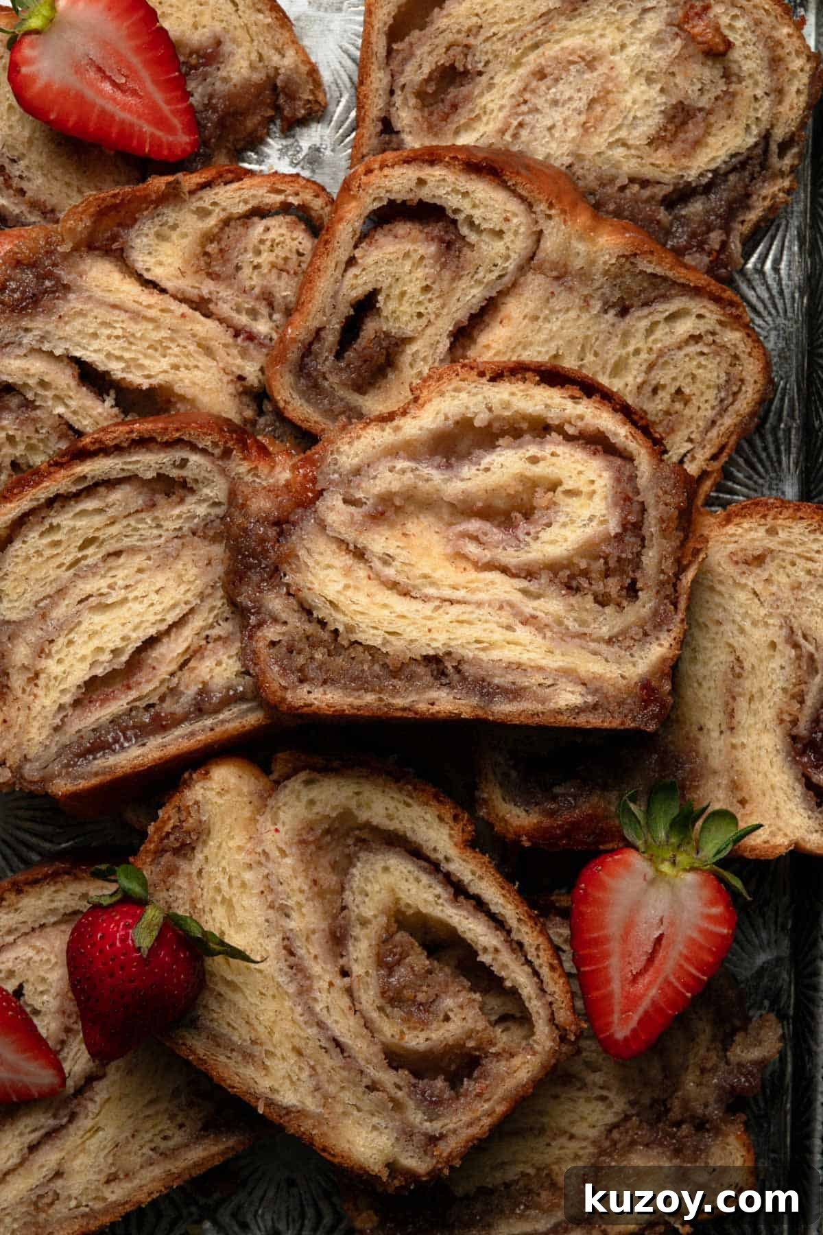 strawberry babka slices with fresh strawberries.