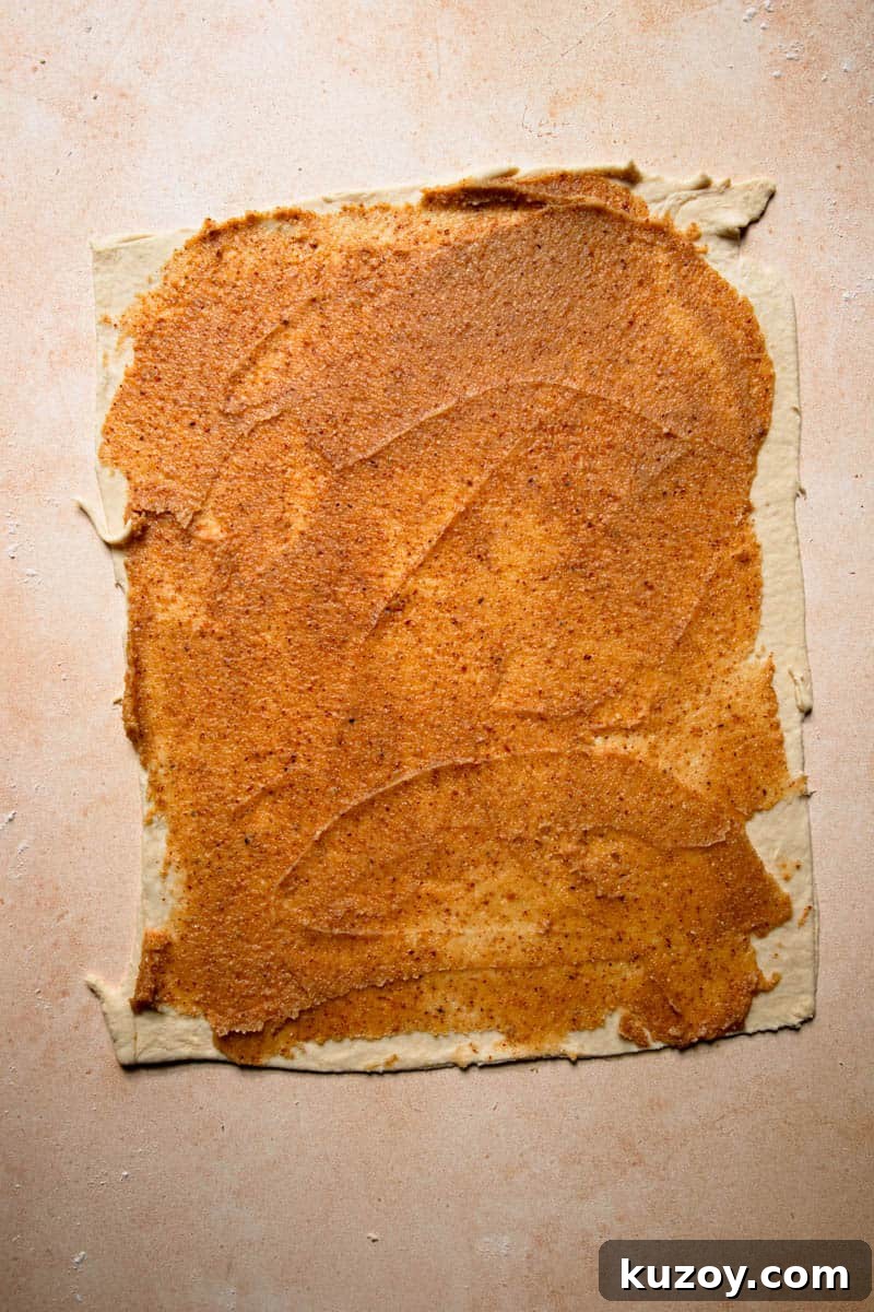 A rolled rectangle dough topped with almond cream.