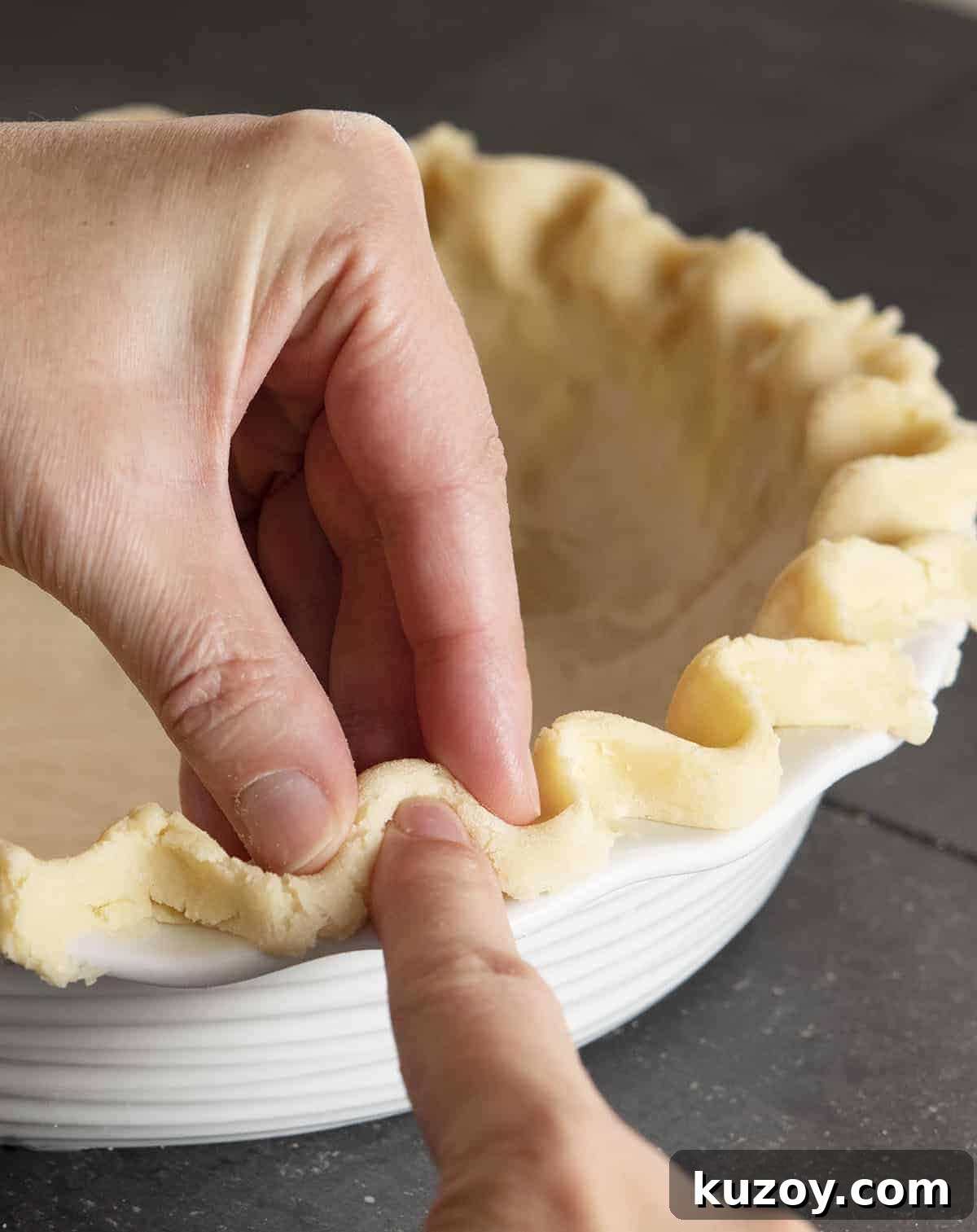 Flaky Lard Pie Crust Recipe for Perfect Homemade Pies 2 Fluting Lard Pie Crust