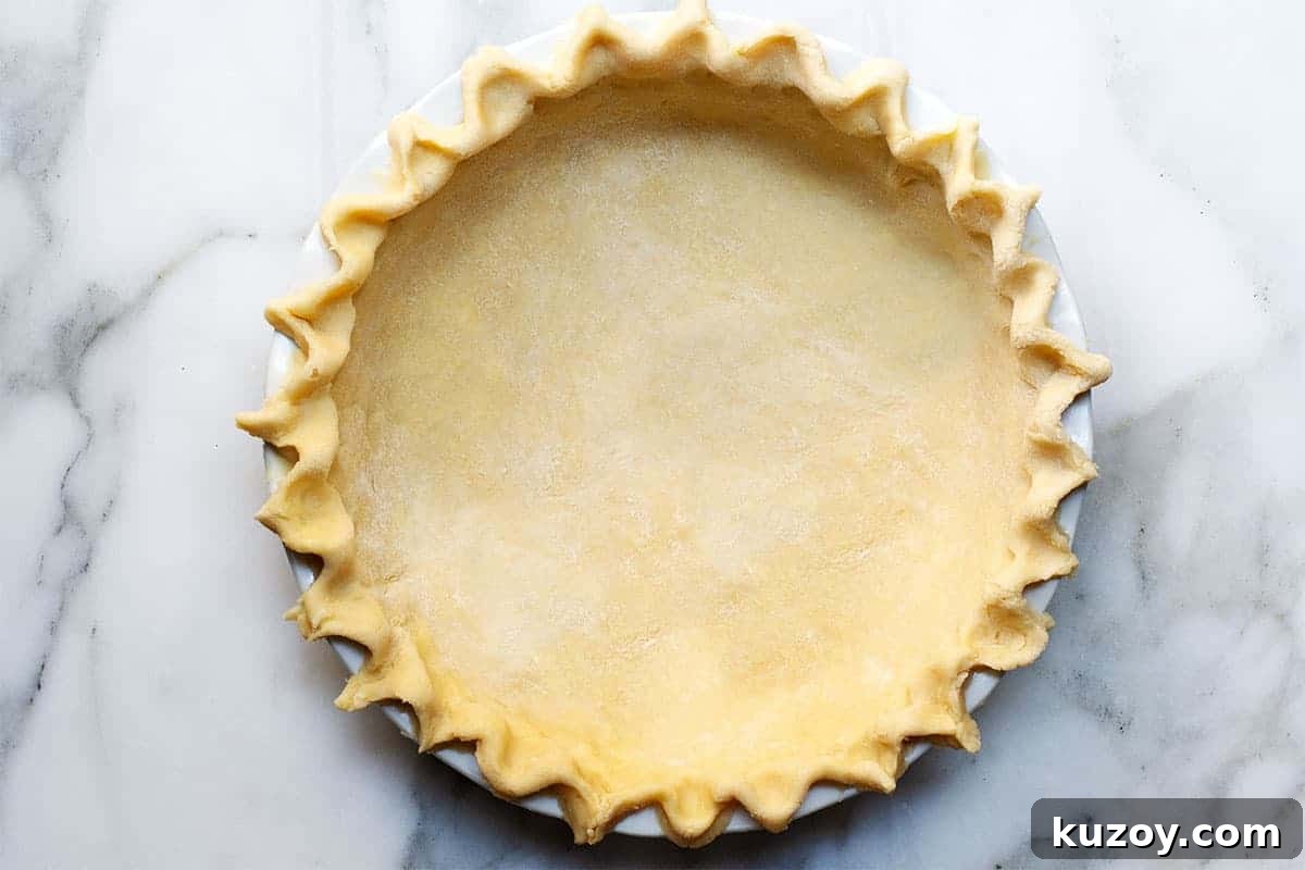 Flaky Lard Pie Crust Recipe for Perfect Homemade Pies 11 Lard Pie Crust in pie plate